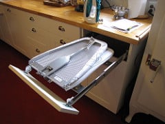 Built-in ironing board in kitchen