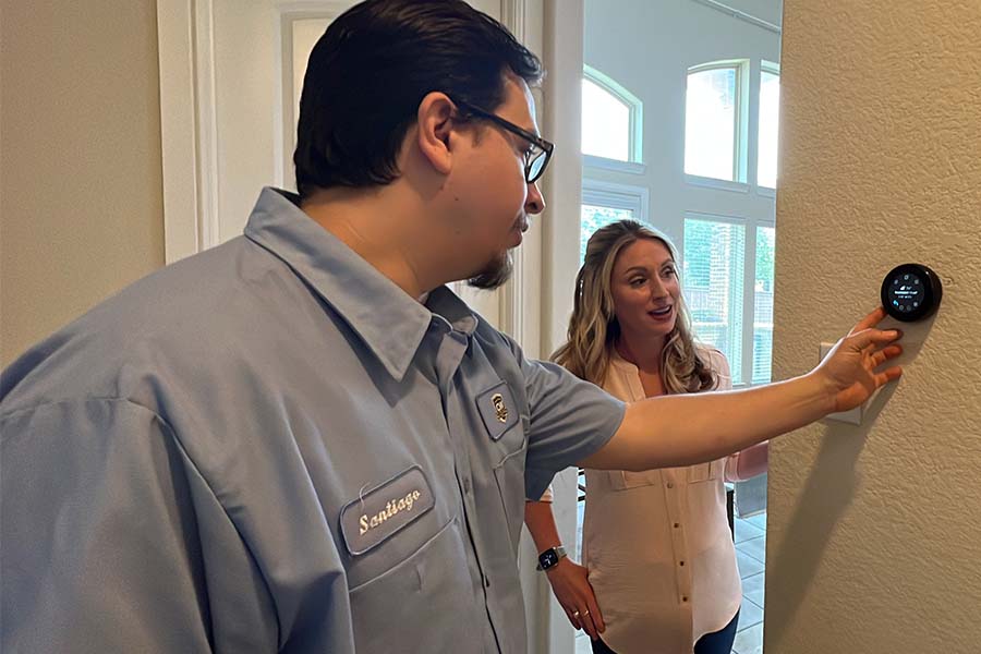 Smart thermostat installed in a Lewisville residential home