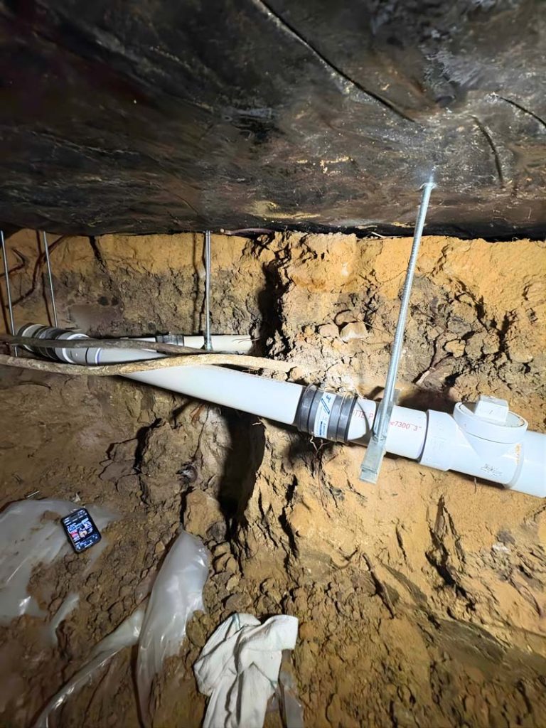 Plumbing repair work in crawl space under house in Lewisville TX