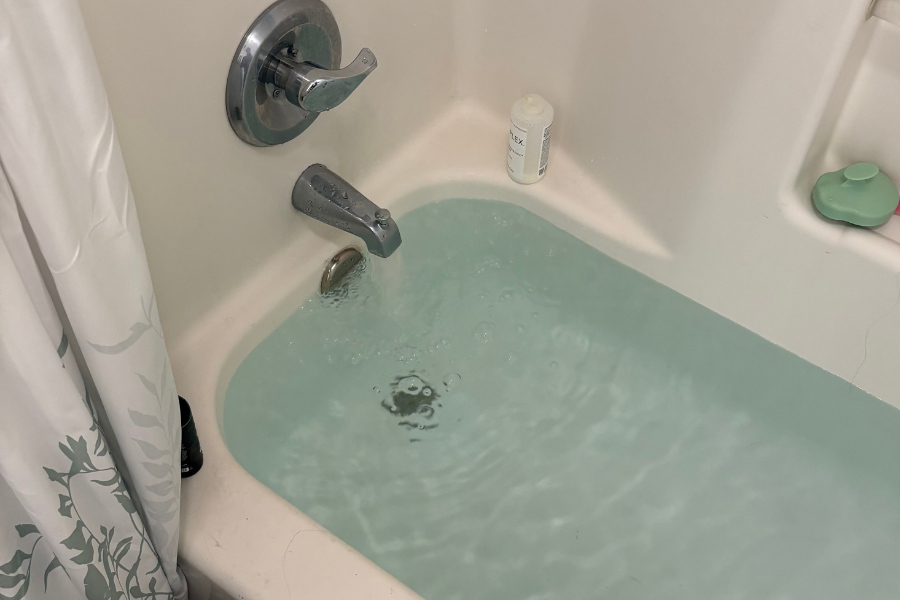 Bathroom water overflow inspected by plumber in Grapevine TX