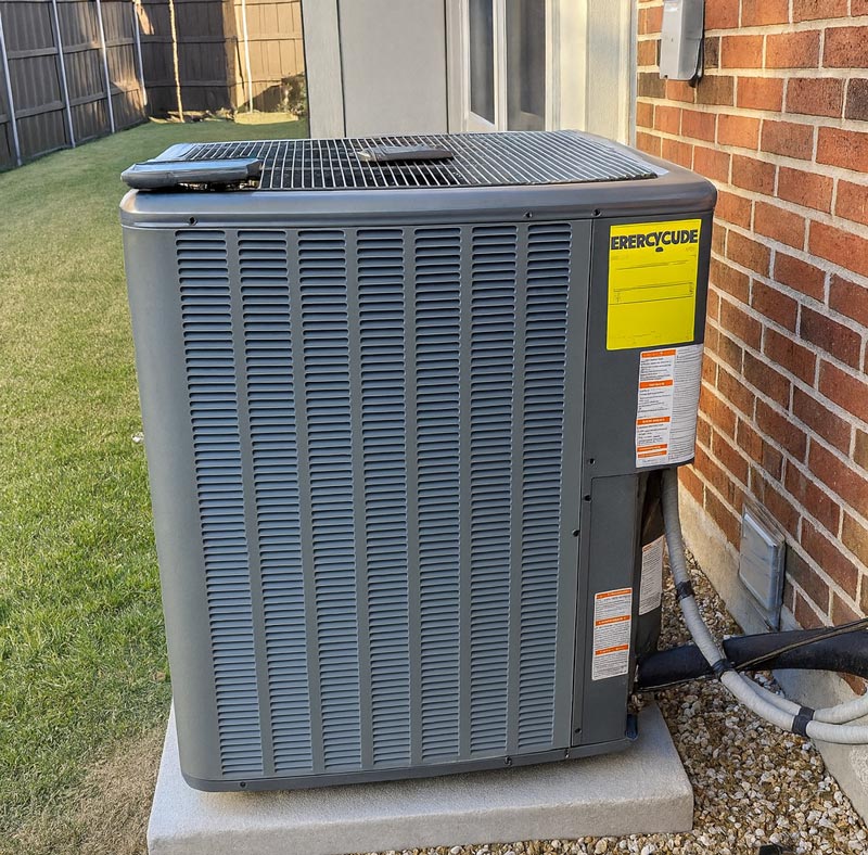 New heat pump replaced in Las Colinas TX home exterior yard