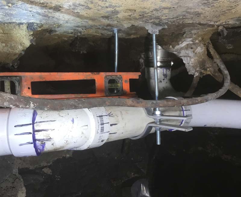 CW Service Pros plumber inspecting sewer pipe